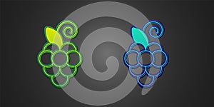 Green and blue Grape fruit icon isolated on black background. Vector