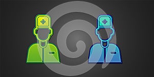 Green and blue Male doctor icon isolated on black background. Vector