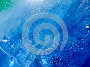 Green-blue sea wave with epoxy bubbles. Abstract background on a wooden mold with a marine theme. themes