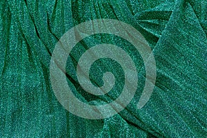 Green blue sparkle festive pleated background