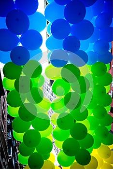 Green, blue and yellow balloons make a nice background