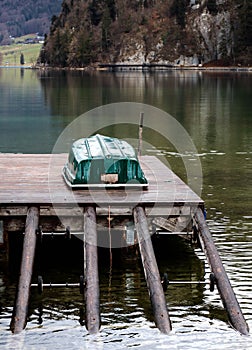 green boat on the jetty at Strobl lake