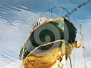 Green Boat Reflections