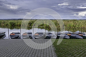 Green boats and red lifebuoys