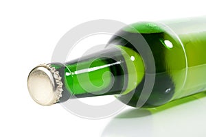 Green bottle of beer horizontally
