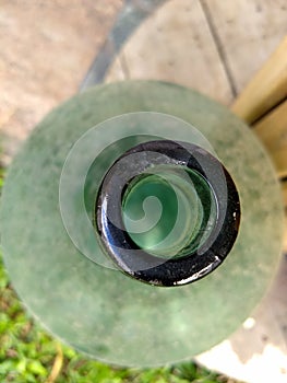 Green bottle in the garden photo
