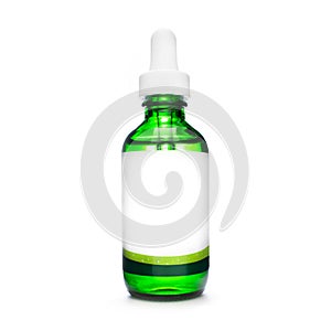 Green bottle with pipette. dropper bottle with serum. cosmetic oil on white background. essential oils isolated. natural oil