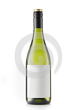 Green bottle of white wine with blank label on white background