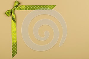 Green bow for gift card for Christmas