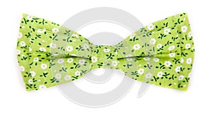 Green bow tie with a pattern with summer flowers