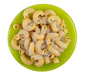 Green bowl with raw pasta cavatappi isolated on white. Top view