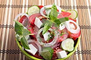 Green bowl of tasty and useful food for raw foodists