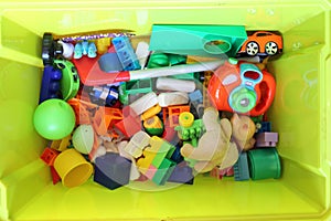 Green box with children`s toys