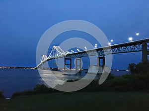Green bridge going over the ocean in Narragansett, Rhode Island photo