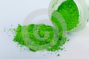 Green bright pigment on a white background