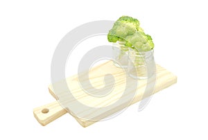 Green broccoli cabbage flowers in bottle