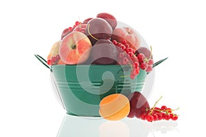 Green bucket fresh summer fruit