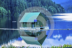 Green Building Capilano Reservoir Lake Reflection Vancouver Brit