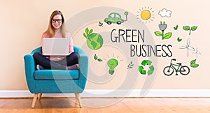 Green Business with young woman using her laptop