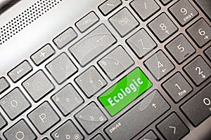 Green button on the computer with the text Ecologic