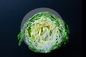 Green cabbage close-up isolated on black background