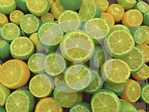 Green calamondin and some yellow citrus fruit