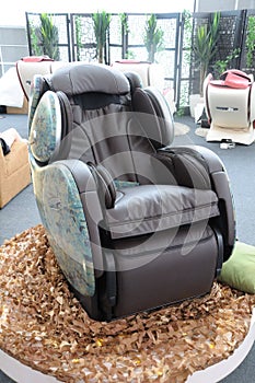 A green camouflage design robotic massage chair