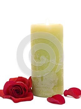 Green candle with rose flower