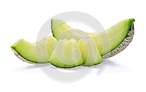 Green cantaloupe melon slices on white background