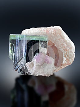 Green cap torumaline with purple apatite and muscovite Mineral specimen from Afghanistan