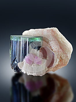 Green cap torumaline with purple apatite and muscovite Mineral specimen from Afghanistan