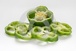 Green capsicum or sweet pepper on white background