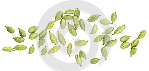 Green cardamom seeds isolated on white background, top view. Dried cardamom pods