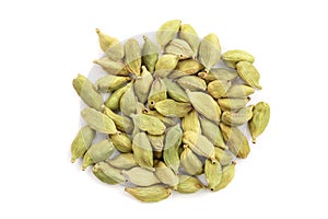 Green cardamom seeds isolated on white background. Top view. Flat lay