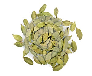 Green cardamom seeds isolated on white background. Top view. lay flat