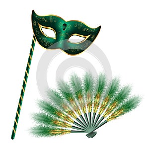 Green carnival venetian mask, masquerade feather fan with gold ornament, isolated on white background