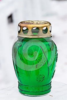 Green cemetery lantern candle