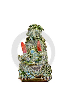 Green ceramic dragon figurine