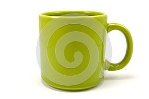 green ceramic teacup