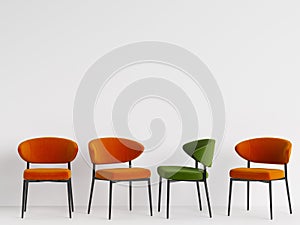 A green chair among orange chairs on white backgrond