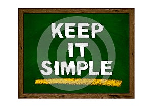 Green chalkboard with wooden frame showing: Keep it Simple