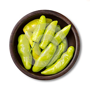 Green cheiro scent/smell pepper on a bowl isolated over white background photo