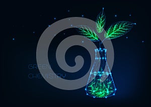 Green chemistry concept with glowing chemical beaker and plant with green leaves made of stars, lines, dots, triangles.