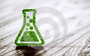 Green chemistry industry sign on black wooden background.