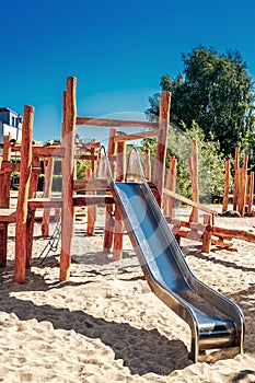 Green children`s skated made of natural wood