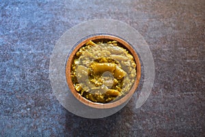 Green chili pickle in a bowl