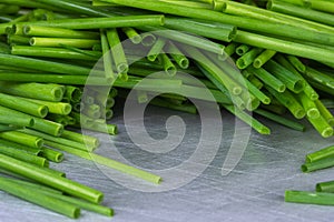 Green chopped chives on kitchen table