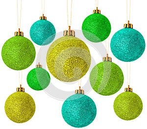 Green christmas baubles on white