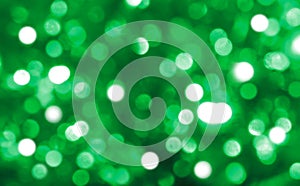 Green Christmas bokeh background, white and green circles, holiday, blurred, bright, light