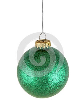 Green christmas glass ball on white background